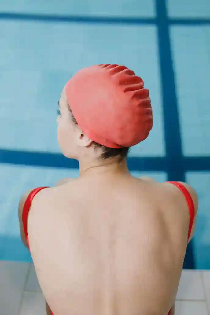 Corrección de la brazada en clase de natación